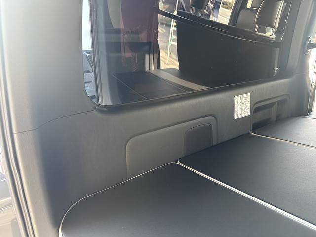 ハイエースバン スーパーＧＬ　ダークプライムＩＩ　ＢＩＧ－ＤＡ／パワ－スライドドア／パノラミックビューモニター／ＴＲＤフロントスポイラー／バルベロ１７インチアルミホイール／ベッドキット（55枚目）