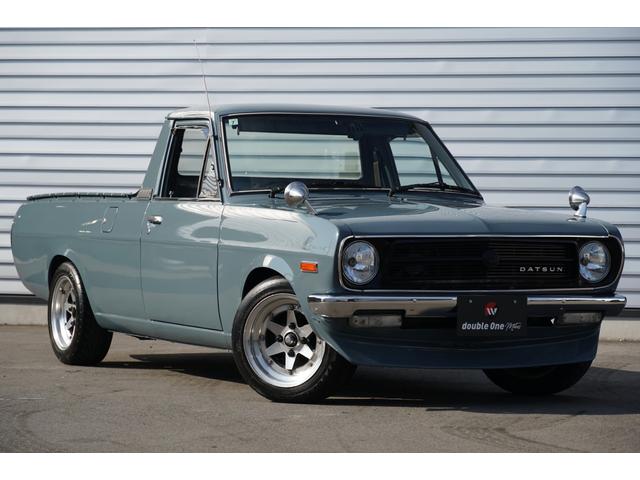 サニートラック ロングDX 5速ミッション 全塗装 ローダウン リアエアサス コブラシート 丸目フェイス ナルディステアリング CDデッキ ETC エアコン 社外14AW(6枚目)