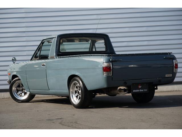 サニートラック ロングDX 5速ミッション 全塗装 ローダウン リアエアサス コブラシート 丸目フェイス ナルディステアリング CDデッキ ETC エアコン 社外14AW(8枚目)