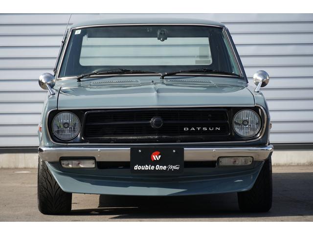 サニートラック ロングDX 5速ミッション 全塗装 ローダウン リアエアサス コブラシート 丸目フェイス ナルディステアリング CDデッキ ETC エアコン 社外14AW(11枚目)