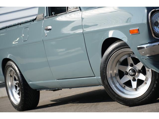 サニートラック ロングDX 5速ミッション 全塗装 ローダウン リアエアサス コブラシート 丸目フェイス ナルディステアリング CDデッキ ETC エアコン 社外14AW(13枚目)