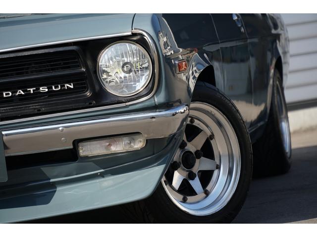 サニートラック ロングDX 5速ミッション 全塗装 ローダウン リアエアサス コブラシート 丸目フェイス ナルディステアリング CDデッキ ETC エアコン 社外14AW(31枚目)