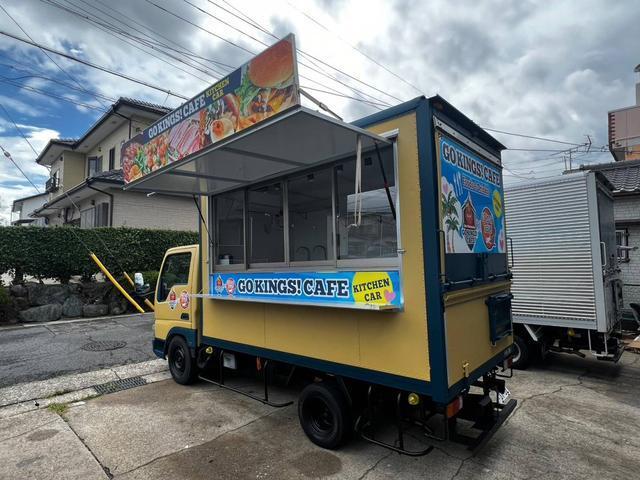 タイタンダッシュ 　キッチンカー　移動販売車　ケータリングカー　フードトラック（Ｃ）／全塗装　側面跳上扉＋テーブル．窓サッシ．シンク．換気扇．床．照明．外部電源．コンセント．８ナンバー登録（32枚目）