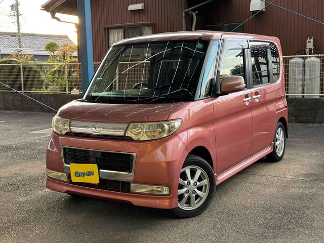 タント カスタムＸリミテッド　ＥＴＣ　電動スライドドア　ナビ　ＨＩＤ　スマートキー　ベンチシート　ＣＶＴ　盗難防止システム　ＡＢＳ　ＣＤ　アルミホイール　衝突安全ボディ　エアコン　パワーステアリング　パワーウィンドウ（3枚目）