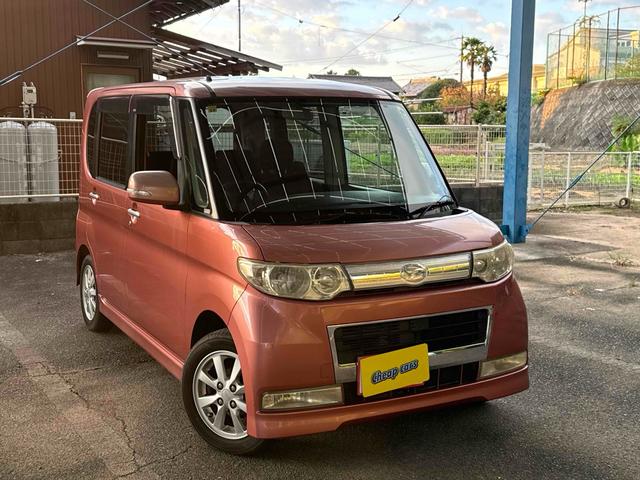 タント カスタムＸリミテッド　ＥＴＣ　電動スライドドア　ナビ　ＨＩＤ　スマートキー　ベンチシート　ＣＶＴ　盗難防止システム　ＡＢＳ　ＣＤ　アルミホイール　衝突安全ボディ　エアコン　パワーステアリング　パワーウィンドウ（4枚目）