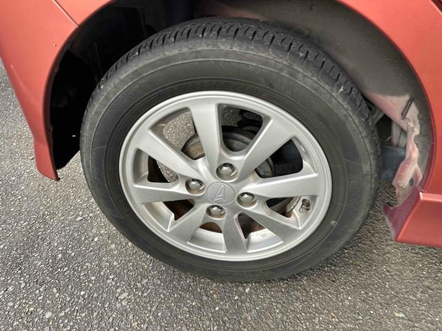 タント カスタムＸリミテッド　ＥＴＣ　電動スライドドア　ナビ　ＨＩＤ　スマートキー　ベンチシート　ＣＶＴ　盗難防止システム　ＡＢＳ　ＣＤ　アルミホイール　衝突安全ボディ　エアコン　パワーステアリング　パワーウィンドウ（10枚目）