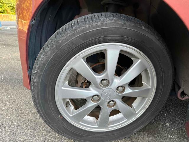 タント カスタムＸリミテッド　ＥＴＣ　電動スライドドア　ナビ　ＨＩＤ　スマートキー　ベンチシート　ＣＶＴ　盗難防止システム　ＡＢＳ　ＣＤ　アルミホイール　衝突安全ボディ　エアコン　パワーステアリング　パワーウィンドウ（17枚目）