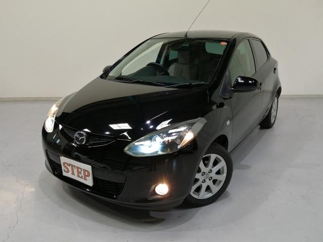 デミオ 13C 5速マニュアル 禁煙車 ドライビングコンフォートパッケージ スマートキー ディスチャージライト イモビライザー 本革巻ステアリング ETC プライバシーガラス 純正15インチアルミ(2枚目)