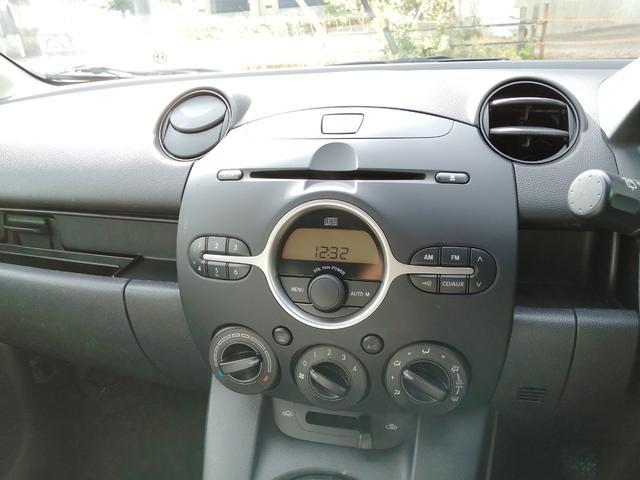 デミオ 13C 5速マニュアル 禁煙車 ドライビングコンフォートパッケージ スマートキー ディスチャージライト イモビライザー 本革巻ステアリング ETC プライバシーガラス 純正15インチアルミ(18枚目)