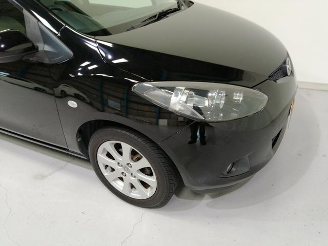 デミオ 13C 5速マニュアル 禁煙車 ドライビングコンフォートパッケージ スマートキー ディスチャージライト イモビライザー 本革巻ステアリング ETC プライバシーガラス 純正15インチアルミ(39枚目)