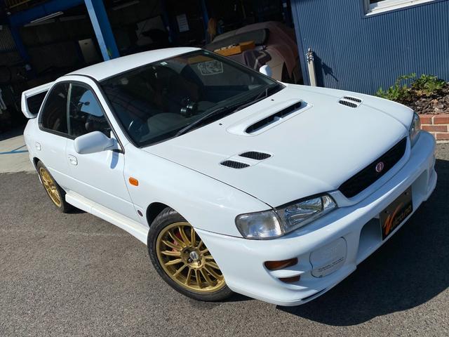 インプレッサ ＷＲＸ　ＳＴｉバージョンＶＩ　ＯＺ１７インチ　車高調　ＳｔｉＧｅｎｏｍｅマフラー　Ｄｅｆｉ追加メーター　ＬＡＭＣＯ三連メーター　ステンメッシュブレーキホース　スリットブレーキローター　クスコロアアームバー　ターボタイマー（15枚目）