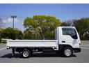 １．５ｔ　平ボディ　低床　Ｗタイヤ　１．５ｔ積載　平ボディ　低床　Ｗタイヤ　電動格納ミラー　ＥＴＣ　集中ロック　荷台鉄板張り　アオリ鉄板張り　荷台内寸３１０／１６０／３８　荷台高７８　車両総重量３２５５ｋｇ　普通免許運転可（10枚目）