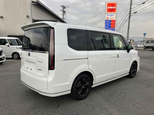 ステップワゴン ｅ：ＨＥＶスパーダ　ＥＴＣ　全周囲カメラ　ナビ　ＴＶ　クリアランスソナー　オートクルーズコントロール　レーンアシスト　衝突被害軽減システム　両側電動スライドドア　オートライト　ＬＥＤヘッドランプ　スマートキー（31枚目）