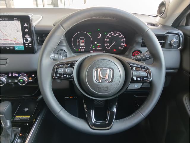 ヴェゼル ｅ：ＨＥＶ　Ｚ　元試乗車／純正コネクトナビ／マルチビューカメラ／衝突軽減ブレーキ／サイドカーテンエアバッグ／クルーズコントロール／ＥＴＣ／前席シートヒーター／ＶＳＡ／Ｂｌｕｅｔｏｏｔｈ／フルセグＴＶ／スマートキー（12枚目）