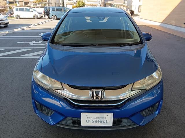 フィットハイブリッド Ｆパッケージ　社外ナビ／スタッドレスタイヤ付／ワンセグＴＶ／ＥＴＣ／スマートキー／プッシュスタート／アイドリングストップ／スペアキー／横滑り防止システム／イモビライザー／ハロゲンライト／パワステ（21枚目）