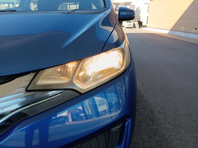 フィットハイブリッド Ｆパッケージ　社外ナビ／スタッドレスタイヤ付／ワンセグＴＶ／ＥＴＣ／スマートキー／プッシュスタート／アイドリングストップ／スペアキー／横滑り防止システム／イモビライザー／ハロゲンライト／パワステ（24枚目）