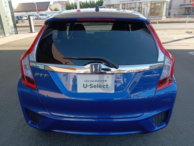 フィットハイブリッド Ｆパッケージ　社外ナビ／スタッドレスタイヤ付／ワンセグＴＶ／ＥＴＣ／スマートキー／プッシュスタート／アイドリングストップ／スペアキー／横滑り防止システム／イモビライザー／ハロゲンライト／パワステ（29枚目）