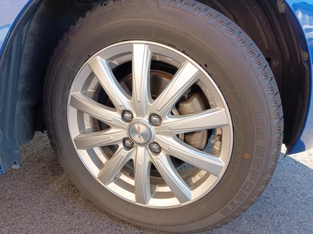 フィットハイブリッド Ｆパッケージ　社外ナビ／スタッドレスタイヤ付／ワンセグＴＶ／ＥＴＣ／スマートキー／プッシュスタート／アイドリングストップ／スペアキー／横滑り防止システム／イモビライザー／ハロゲンライト／パワステ（32枚目）