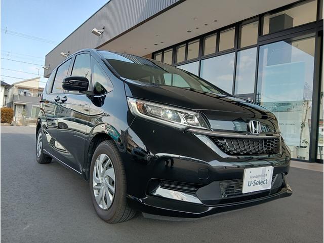 フリード Ｇ・ホンダセンシング　社外ナビ／ＣＤ／ＤＶＤ／後席ヘッドレストツインモニター／両側電動スライドドア／アイドリングストップ／社外ウーファー／ＥＴＣ／ドラレコ（フロントのみ）／Ｂｌｕｅｔｏｏｔｈ／ＬＥＤヘッド／スマートキー（29枚目）