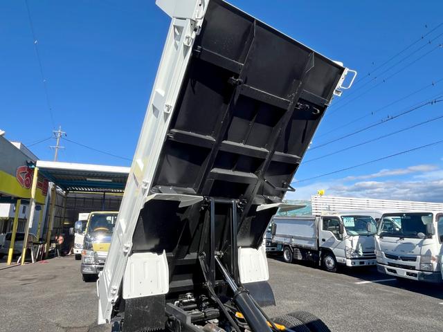 キャンター ３トン強化ダンプ　衝突軽減ブレーキ　サイドガードアシスト　１０ｉｎｃｈ液晶モニター　ステアリングスイッチ　イージーアクセスキー　バックモニター　ＬＥＤヘッドライト　５ＭＴ　未使用車（10枚目）
