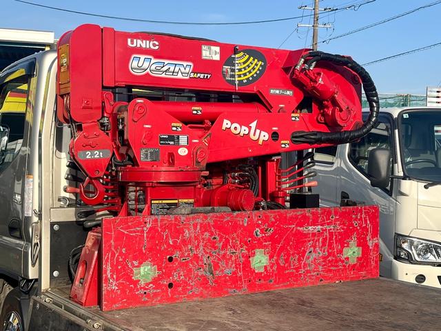 キャンター ２トン平簡易クレーン　ＵＮＩＣ４段クレーン　２．２２トン吊り　アウトリガー　過巻防止装置　衝突軽減ブレーキ　車線逸脱警報　ナビＴＶ　バックモニター　ＥＴＣ　キーレス　５ＭＴ（10枚目）