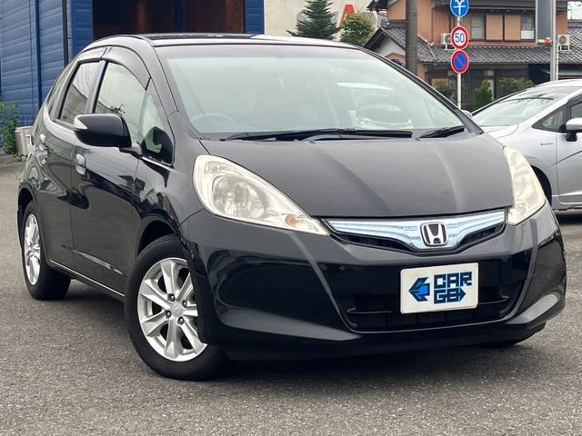 フィットハイブリッド ナビプレミアムセレクション　純正ナビ・バックカメラ・シートヒーター・クルーズコントロール・パドルシフト・横滑り防止装置・アイドリングストップ・ＥＴＣ（2枚目）