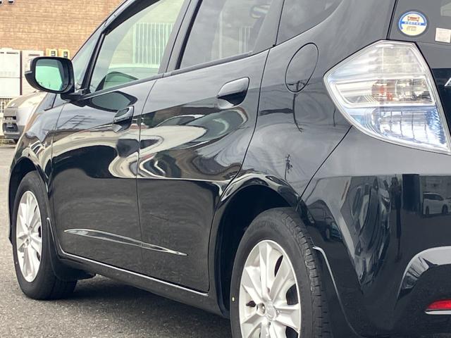 フィットハイブリッド ナビプレミアムセレクション　純正ナビ・バックカメラ・シートヒーター・クルーズコントロール・パドルシフト・横滑り防止装置・アイドリングストップ・ＥＴＣ（9枚目）