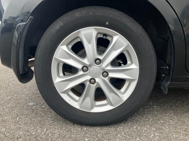 フィットハイブリッド ナビプレミアムセレクション　純正ナビ・バックカメラ・シートヒーター・クルーズコントロール・パドルシフト・横滑り防止装置・アイドリングストップ・ＥＴＣ（16枚目）