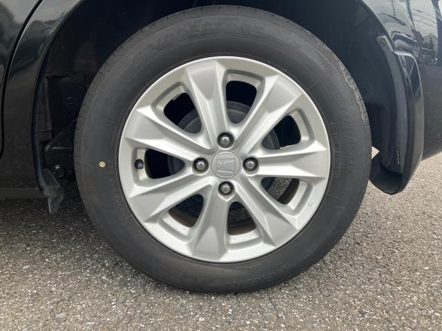 フィットハイブリッド ナビプレミアムセレクション　純正ナビ・バックカメラ・シートヒーター・クルーズコントロール・パドルシフト・横滑り防止装置・アイドリングストップ・ＥＴＣ（18枚目）