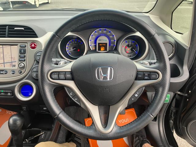 フィットハイブリッド ナビプレミアムセレクション　純正ナビ・バックカメラ・シートヒーター・クルーズコントロール・パドルシフト・横滑り防止装置・アイドリングストップ・ＥＴＣ（35枚目）