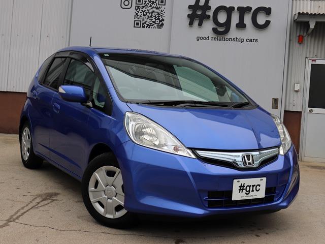 フィットハイブリッド ベースグレード 禁煙車 ワンオーナー車 塗装ハゲアセ無し 樹脂色アセ無し 下回りサビ腐食無し エンジンルームサビ腐食無し バックカメラ付き純正SDナビ ETC クルーズコントロール スペアキー付き(2枚目)