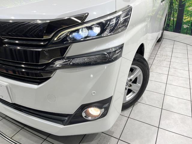 ヴェルファイア ２．５Ｘ　禁煙車　純正ナビ　両側電動スライドドア　バックカメラ　クリアランスソナー　Ｂｌｕｅｔｏｏｔｈ　ＥＴＣ　ＬＥＤヘッド　オートライト　純正１６インチＡＷ　革巻きステアリング　ステアリングスイッチ（13枚目）