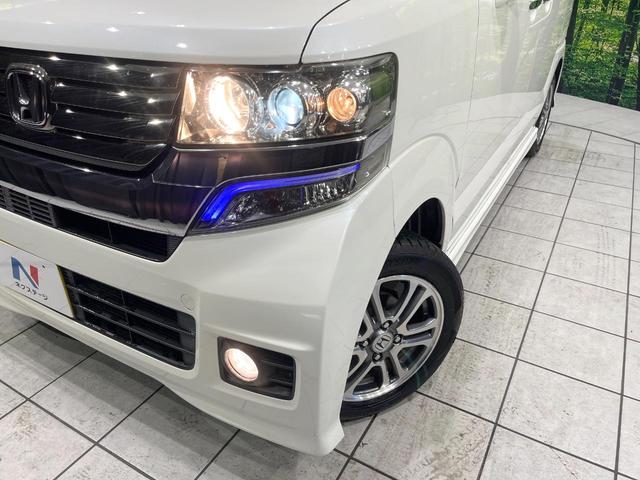 N-BOXカスタム G SSパッケージ 禁煙車 SDナビ 両側電動ドア 衝突軽減 バックカメラ ETC HIDヘッド ドライブレコーダー フルセグ スマートキー 純正14インチAW ステアリングリモコン オートライト オートエアコン(12枚目)