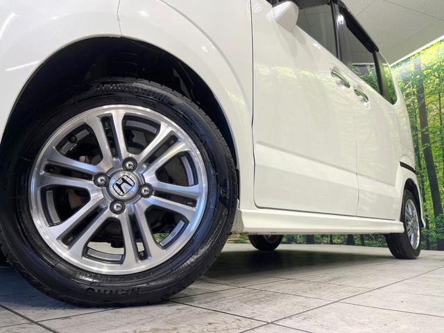 N-BOXカスタム G SSパッケージ 禁煙車 SDナビ 両側電動ドア 衝突軽減 バックカメラ ETC HIDヘッド ドライブレコーダー フルセグ スマートキー 純正14インチAW ステアリングリモコン オートライト オートエアコン(13枚目)