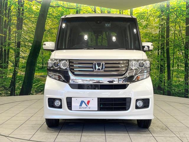 N-BOXカスタム G SSパッケージ 禁煙車 SDナビ 両側電動ドア 衝突軽減 バックカメラ ETC HIDヘッド ドライブレコーダー フルセグ スマートキー 純正14インチAW ステアリングリモコン オートライト オートエアコン(14枚目)