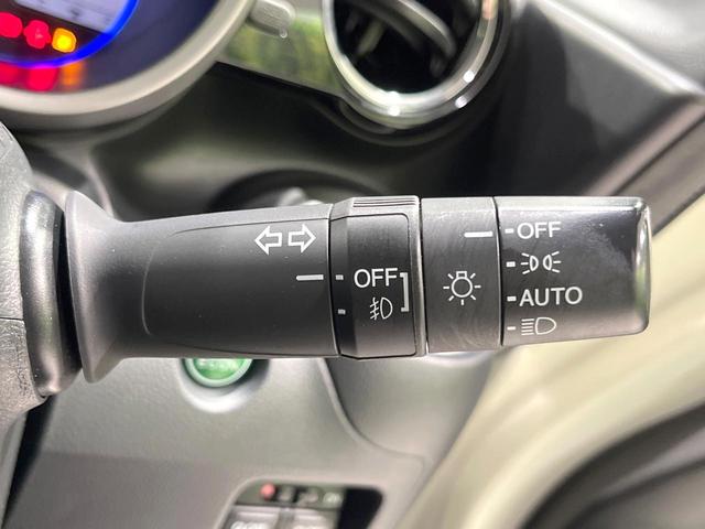 N-BOXカスタム G SSパッケージ 禁煙車 SDナビ 両側電動ドア 衝突軽減 バックカメラ ETC HIDヘッド ドライブレコーダー フルセグ スマートキー 純正14インチAW ステアリングリモコン オートライト オートエアコン(30枚目)