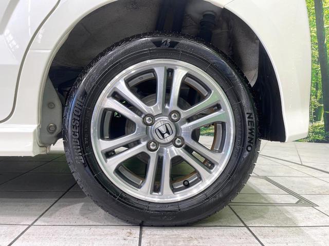 N-BOXカスタム G SSパッケージ 禁煙車 SDナビ 両側電動ドア 衝突軽減 バックカメラ ETC HIDヘッド ドライブレコーダー フルセグ スマートキー 純正14インチAW ステアリングリモコン オートライト オートエアコン(48枚目)