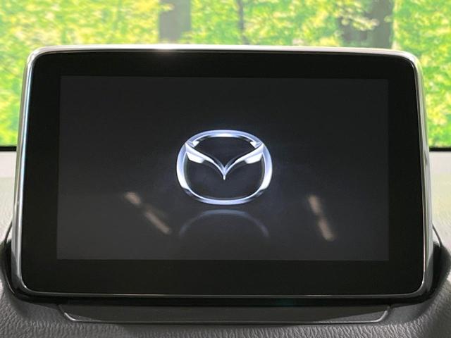 デミオ ＸＤツーリング　ディーゼル　ターボ　禁煙車　純正ナビ　衝突軽減　ＥＴＣ　Ｂｌｕｅｔｏｏｈ　バックカメラ　スマートキー　ＬＥＤヘッド　クルーズコントロール　純正１６インチＡＷ　オートライト　盗難防止装置　横滑り防止装置（3枚目）