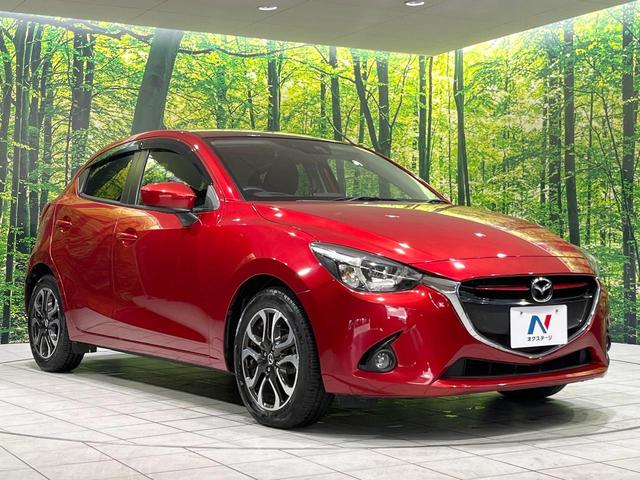 デミオ ＸＤツーリング　ディーゼル　ターボ　禁煙車　純正ナビ　衝突軽減　ＥＴＣ　Ｂｌｕｅｔｏｏｈ　バックカメラ　スマートキー　ＬＥＤヘッド　クルーズコントロール　純正１６インチＡＷ　オートライト　盗難防止装置　横滑り防止装置（16枚目）