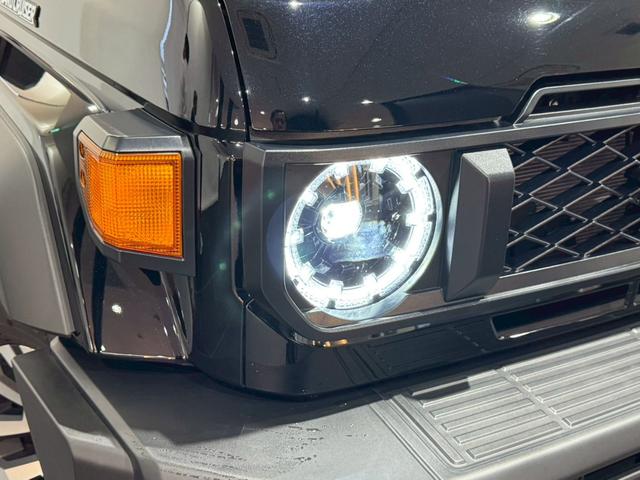 ランドクルーザー７０ ＡＸ　ケンウッドＢｉｇナビ　バックカメラ　フルセグＴＶ　クルーズコントロール　電動デフロック　純正１６インチＡＷ　オートヘッドライト　ヘッドライトリベライザー　純正ドアバイザー　キーレス　ＬＥＤヘッドライト（12枚目）