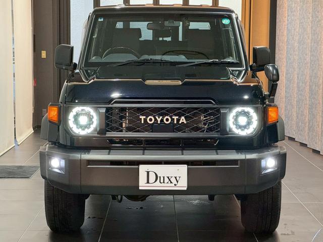 ランドクルーザー７０ ＡＸ　ケンウッドＢｉｇナビ　バックカメラ　フルセグＴＶ　クルーズコントロール　電動デフロック　純正１６インチＡＷ　オートヘッドライト　ヘッドライトリベライザー　純正ドアバイザー　キーレス　ＬＥＤヘッドライト（16枚目）