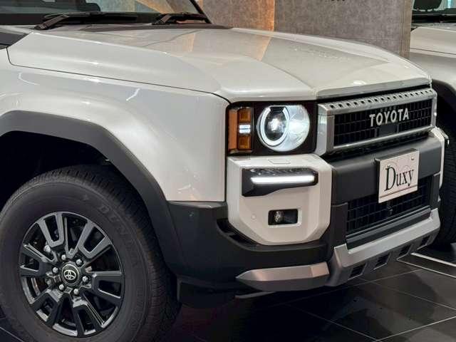 ランドクルーザー250 VX シグネチャーイルミブレード モデリスタパッケージ サンルーフ 丸目ヘッドライト パノラミックビューモニター デジタルインナーミラー ルーフレール ビルトインETC チームメイト HDMI 寒冷地仕様(15枚目)