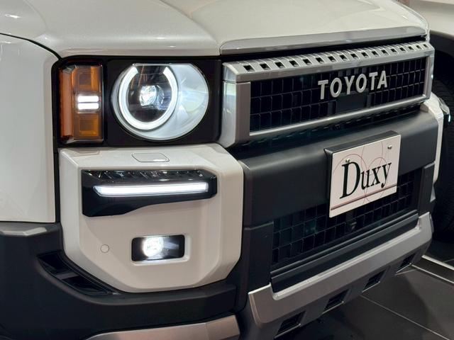 ランドクルーザー250 VX シグネチャーイルミブレード モデリスタパッケージ サンルーフ 丸目ヘッドライト パノラミックビューモニター デジタルインナーミラー ルーフレール ビルトインETC チームメイト HDMI 寒冷地仕様(22枚目)