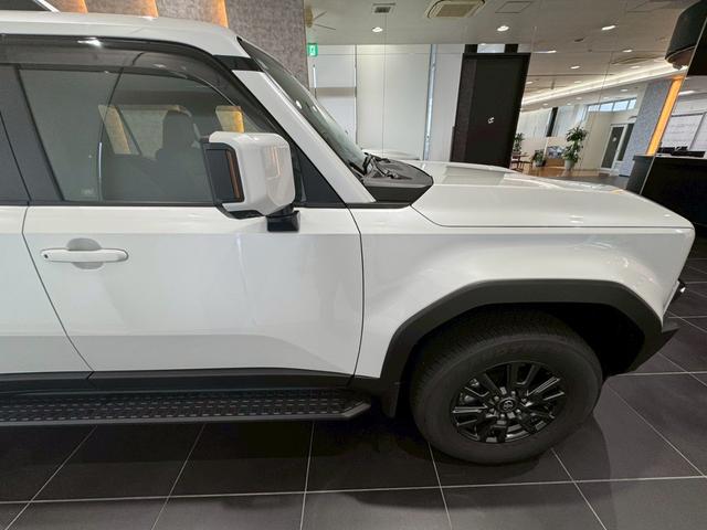 ランドクルーザー250 VX シグネチャーイルミブレード モデリスタパッケージ サンルーフ 丸目ヘッドライト パノラミックビューモニター デジタルインナーミラー ルーフレール ビルトインETC チームメイト HDMI 寒冷地仕様(27枚目)