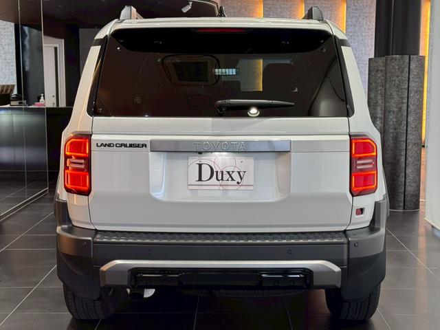 ランドクルーザー250 VX シグネチャーイルミブレード モデリスタパッケージ サンルーフ 丸目ヘッドライト パノラミックビューモニター デジタルインナーミラー ルーフレール ビルトインETC チームメイト HDMI 寒冷地仕様(31枚目)