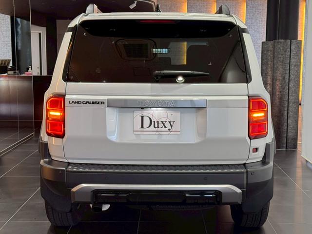 ランドクルーザー250 VX シグネチャーイルミブレード モデリスタパッケージ サンルーフ 丸目ヘッドライト パノラミックビューモニター デジタルインナーミラー ルーフレール ビルトインETC チームメイト HDMI 寒冷地仕様(32枚目)