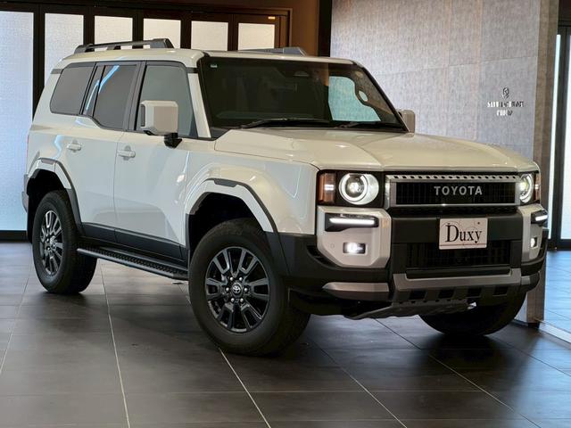 ランドクルーザー２５０ ＶＸ　丸目ヘッドライト　モデリスタパッケージ　モデリスタシグネチャーイルミブレードモデリスタリヤスポイラー　モデリスタオーバーフェンダー　ルーフレール　サンルーフ　ビルトインＥＴＣ　トヨタチームメイト（2枚目）