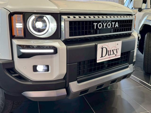 ランドクルーザー２５０ ＶＸ　丸目ヘッドライト　モデリスタパッケージ　モデリスタシグネチャーイルミブレードモデリスタリヤスポイラー　モデリスタオーバーフェンダー　ルーフレール　サンルーフ　ビルトインＥＴＣ　トヨタチームメイト（6枚目）