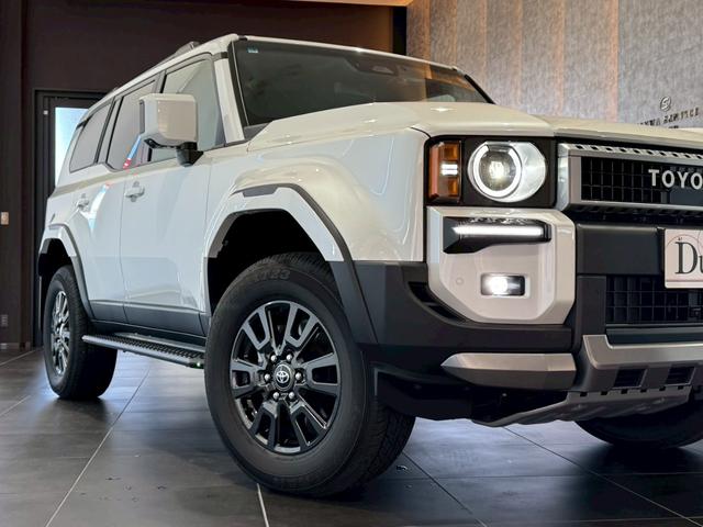 ランドクルーザー２５０ ＶＸ　丸目ヘッドライト　モデリスタパッケージ　モデリスタシグネチャーイルミブレードモデリスタリヤスポイラー　モデリスタオーバーフェンダー　ルーフレール　サンルーフ　ビルトインＥＴＣ　トヨタチームメイト（7枚目）