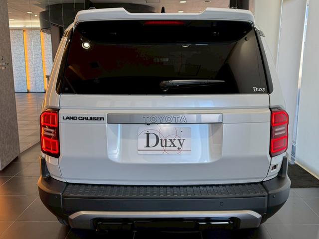 ランドクルーザー２５０ ＶＸ　丸目ヘッドライト　モデリスタパッケージ　モデリスタシグネチャーイルミブレードモデリスタリヤスポイラー　モデリスタオーバーフェンダー　ルーフレール　サンルーフ　ビルトインＥＴＣ　トヨタチームメイト（28枚目）